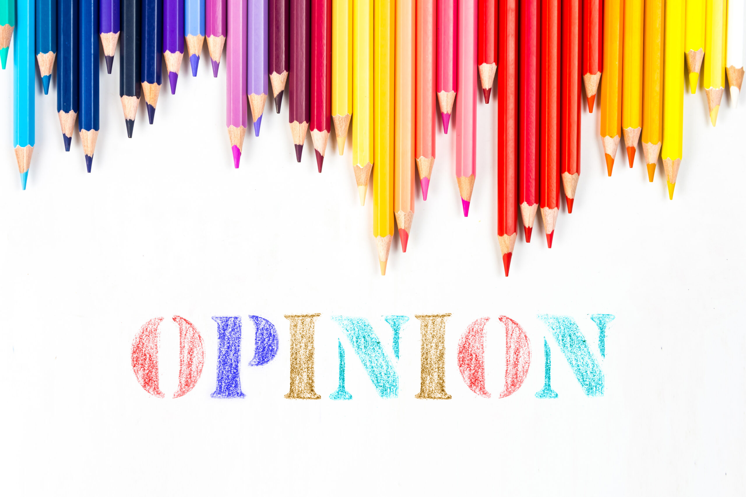 Rainbow of colored pencils with the word Opinion written below
